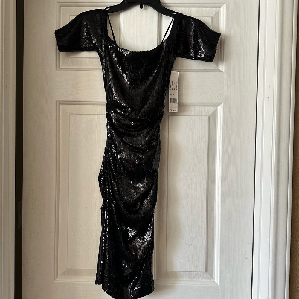 NWT Nicole Miller off the shoulder black sequined dress.